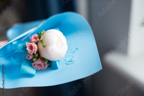 Blue men's buttonhole before the wedding