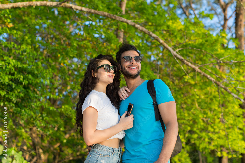 Couple Embracing Tropical Green Forest Summer Vacation, Beautiful Young People In Love, Man Woman Happy Smile Holiday Travel
