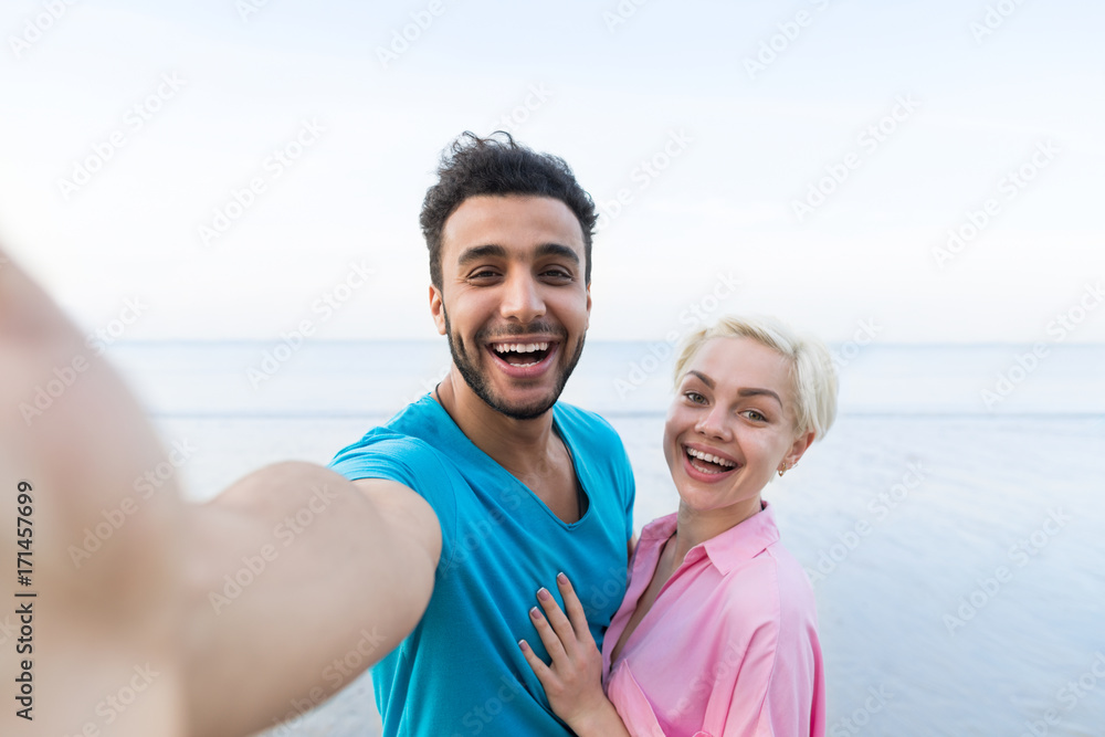 Couple On Beach Summer Vacation, Beautiful Young Happy People Taking Selfie Photo, Man Woman Embrace Sea Ocean Holiday Travel Couple On Beach Summer Vacation, Beautiful Young Happy People Taking Selfie Photo, Man Woman Embrace Sea Ocean Holiday Travel