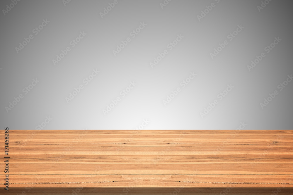 Empty teak wood table top on gray background,space montage you product Empty teak wood table top on gray background,space montage you product