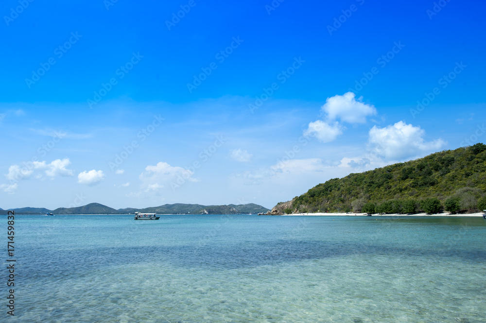 beautiful sea Kham Island rock beach is bright color and crystal clear water near Pattaya Sattaheep Chonburi Thailand