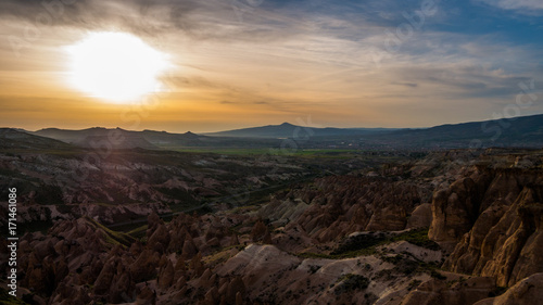 Amazing sunset over fairy rock formation in the mountains in Cappadocia, Central Anatolia,Turkey