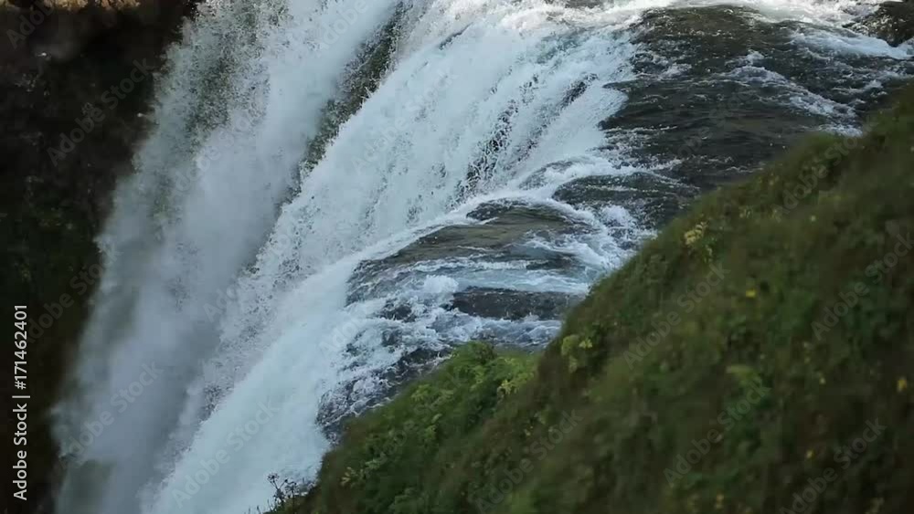 Top of the waterfall. Water boils and falls down. The Skogafoss Waterfall, Iceland. Top of the waterfall. Water boils and falls down. The Skogafoss Waterfall, Iceland.
