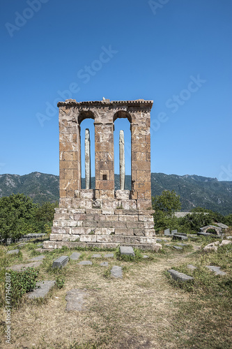  The Odzun Monastery. Monument-headstone./Armenia. The Odzun Monastery. Monument-headstone in the form of a two-arc arcade with two stellas with carved images.