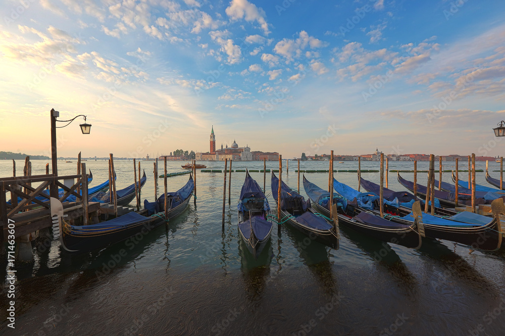 Venetian gondolas at sunrise