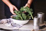 Kale recipes man preparing kale green avocado seeds detox salad
