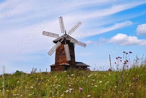 Lovely windmill on a field of flowers. Nizhnyaya Sinyachikha, Sverdlovsk oblast, Russia.