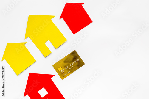 work desk with paper figures for selling house set white background top view space for text Free Download work desk with paper figures for selling house set white background top view space for text - GFXLoad