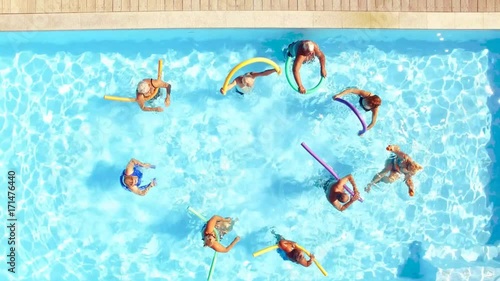Group of seniors swimming in a pool