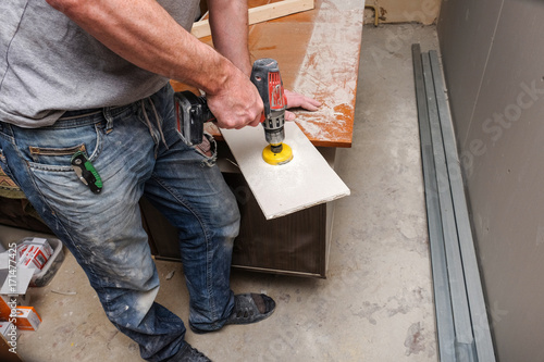 workers make repairs in the apartment