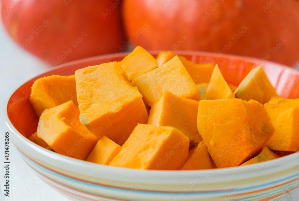 Orange pumpkin cut into pieces Orange pumpkin cut into pieces