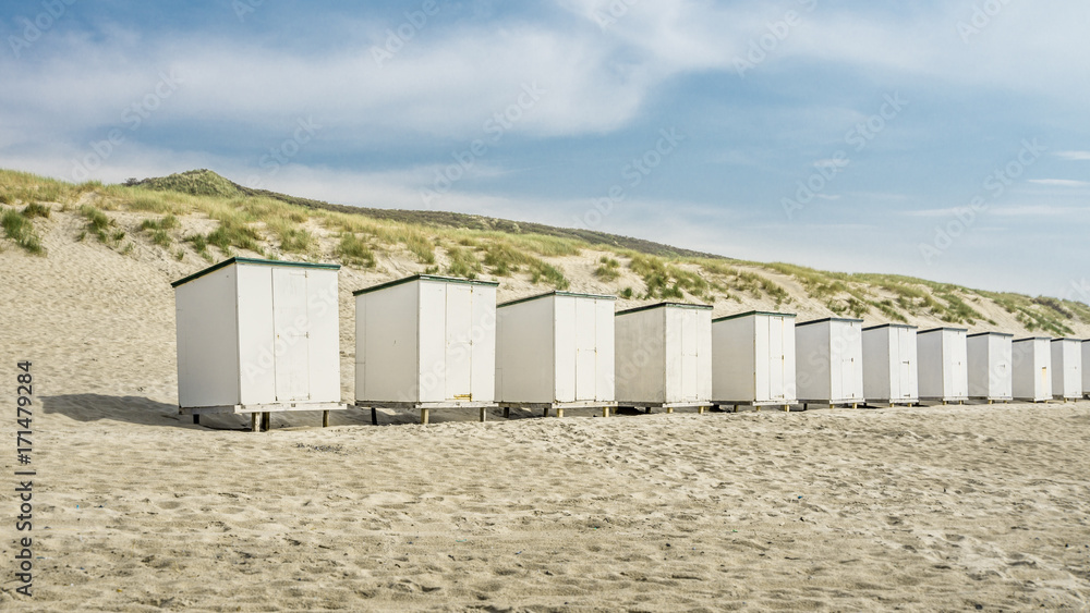Row Of Huts On Beach Against Sky Row Of Huts On Beach Against Sky