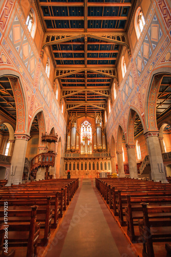 Interior of the Protestant neo-Gothic Church of St. Laurence or St. Laurenzen Kirche, with its delicate floral frescos and star-studded ceiling in St. Gallen, Switzerland. photo