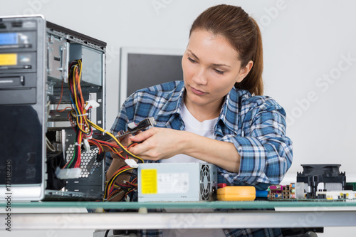 Wallpaper Mural technician fixing cable in server room Torontodigital.ca