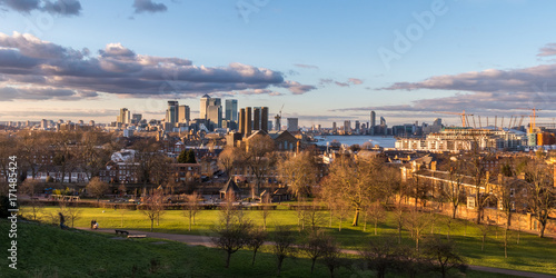 An afternoon view from Greenwich Park, London, England, United Kingdom overlooking the Thames, the O2 arena and Canary Wharf