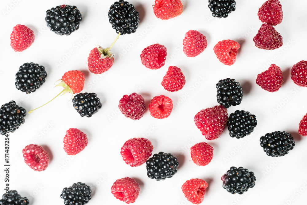 Blackberries and raspberries close up, fruit background Blackberries and raspberries close up, fruit background