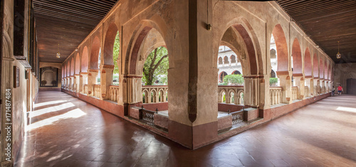 Panoramic view from open arcade gallery of Guadalupe Monastery Cloister