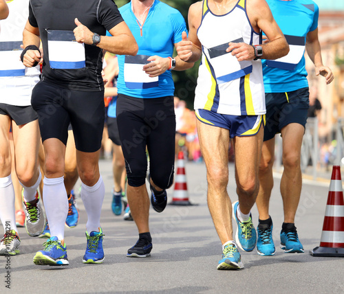athletes during the marathon on the road