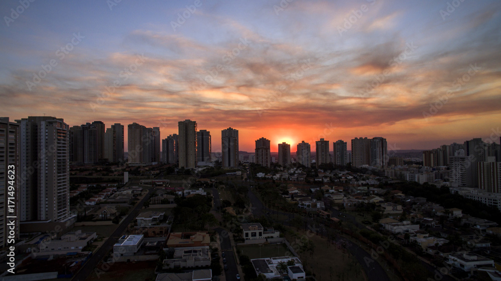 Ribeirao Preto city in Sao Paulo, Brazil. Region of Joao Fiusa Avenue in sunset day.