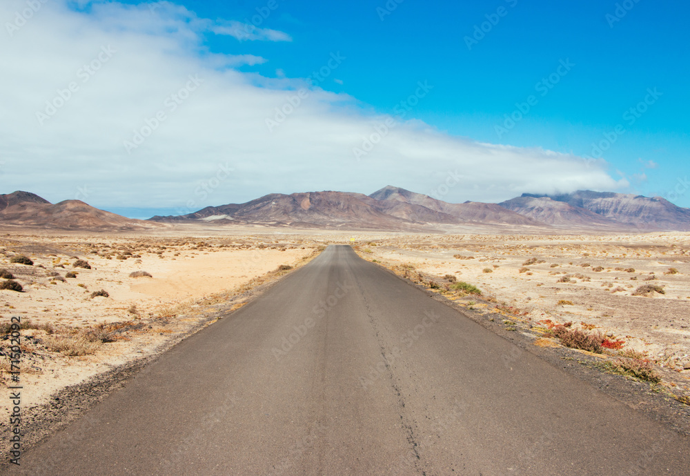 Landscape straight road towards some mountains Landscape straight road towards some mountains