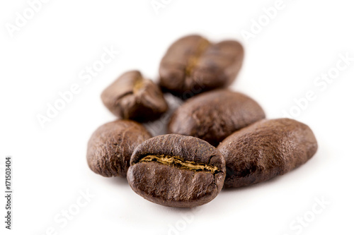 Coffee beans isolated on white background  closeup  macro