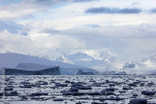 Antarctica landscape, icebergs, mountains and ocean Antarctica