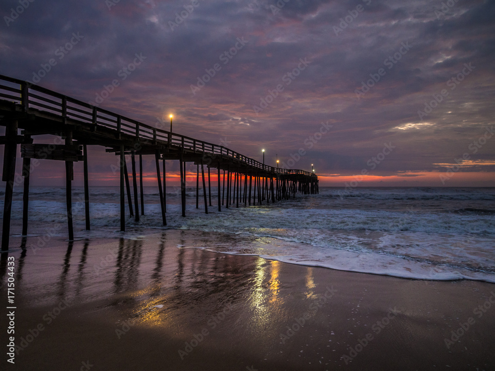 Sunrise over fishing pier at North Carolina Outer Banks Sunrise over fishing pier at North Carolina Outer Banks