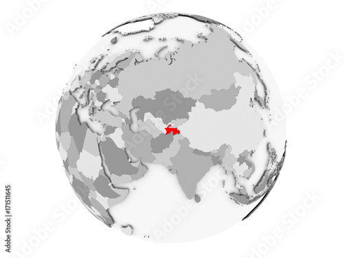 Tajikistan on grey globe isolated