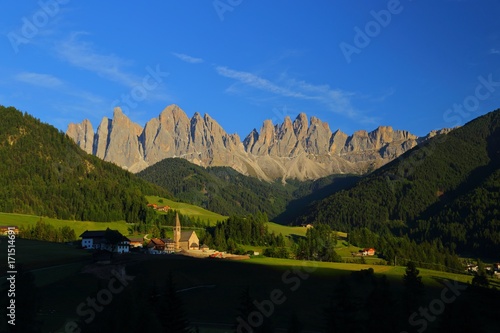 Santa Magdalena village in front of Dolomites Group, Val di Funes, Italy,  photo