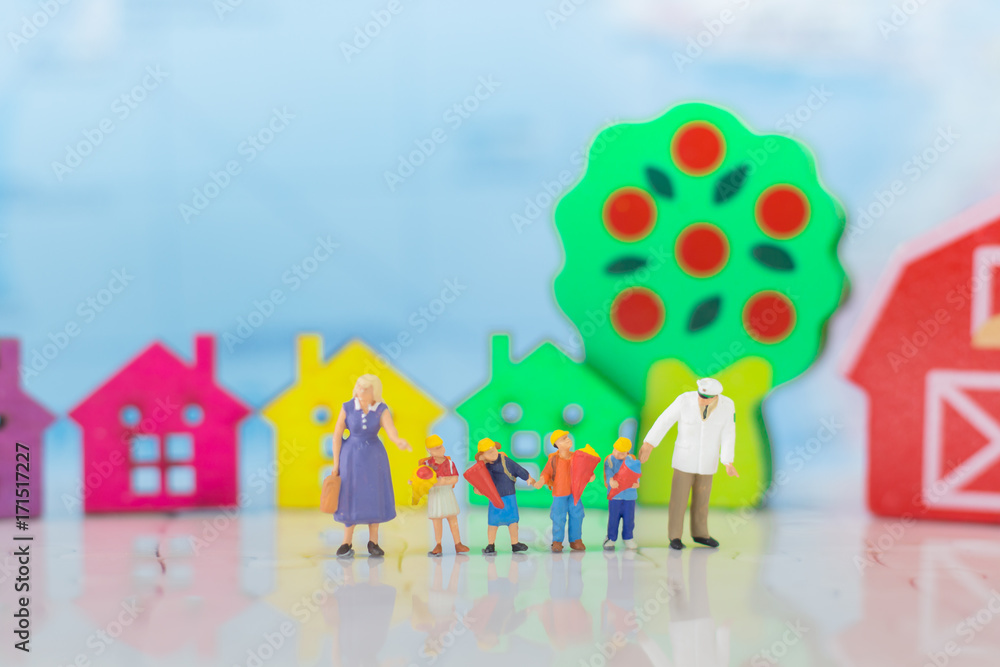 Miniature family using as background International day of families concept.