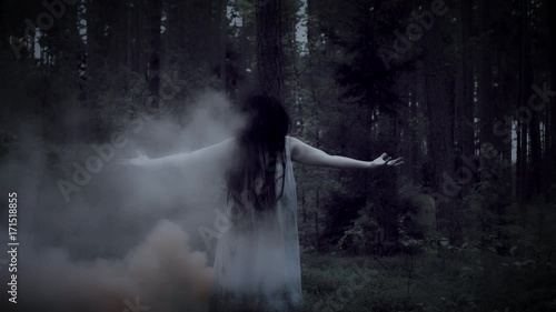 4K Horror Woman Gesturing in Forest with Smoke