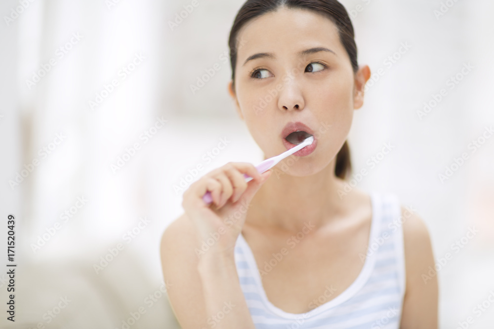 Woman brushing teeth Woman brushing teeth