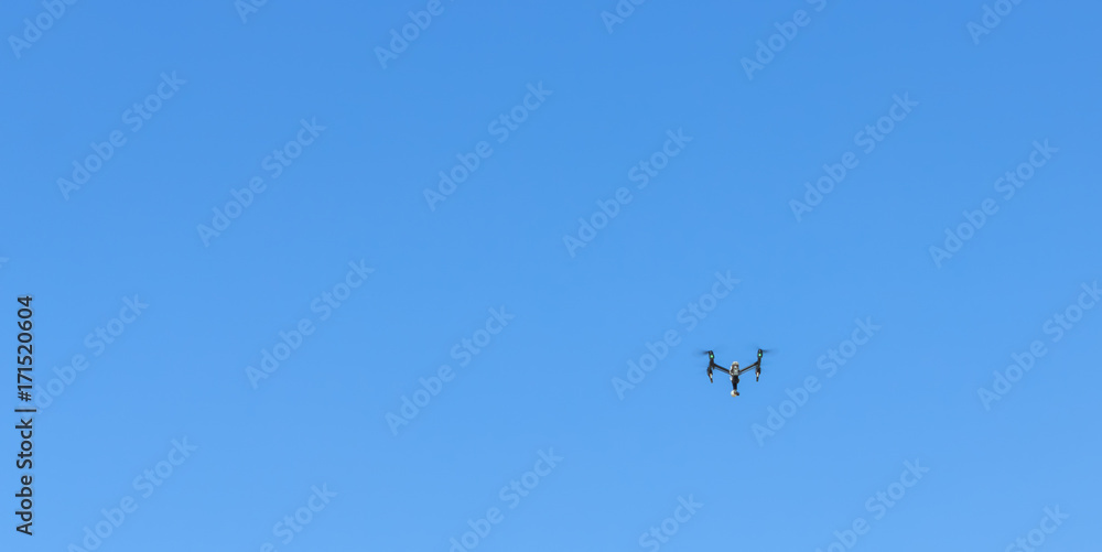 Drones flying in the sky for shooting video. Drones flying in the sky for shooting video.