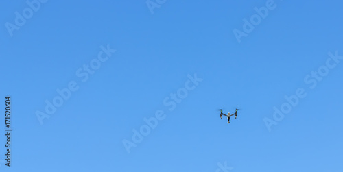 Drones flying in the sky for shooting video.