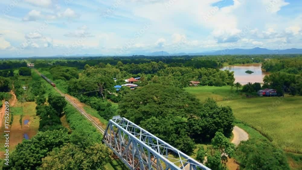 Aerial: Train on Forth Rail Bridge in Uttaradit, Thailand Aerial: Train on Forth Rail Bridge in Uttaradit, Thailand