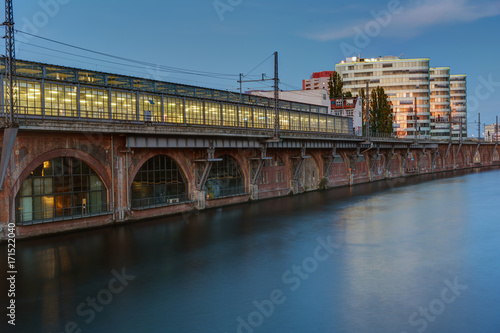 Trainstation at the river Spree in Berlin at dusk