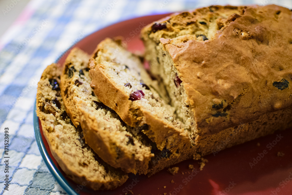 Fresh baked banana bread with fruit and nuts Fresh baked banana bread with fruit and nuts