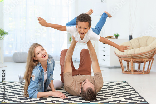 Happy couple playing with a...