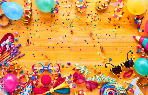 Colorful carnival accessories on table