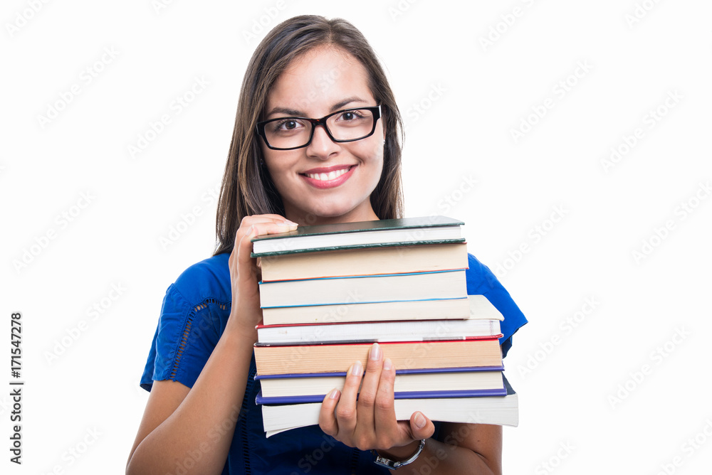 Portrait of student girl holding books and smiling Portrait of student girl holding books and smiling