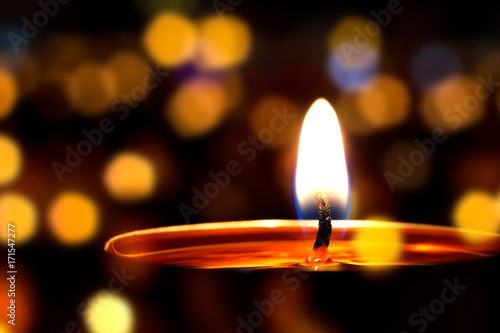 Candles light. Christmas candles burning bokeh background.