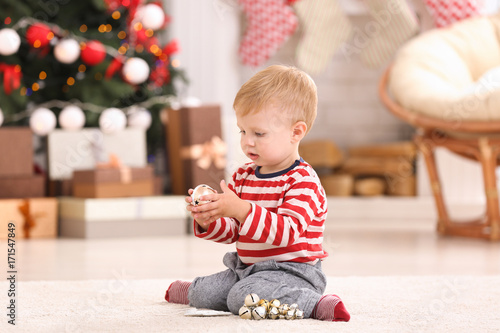 Cute little baby playing wi...