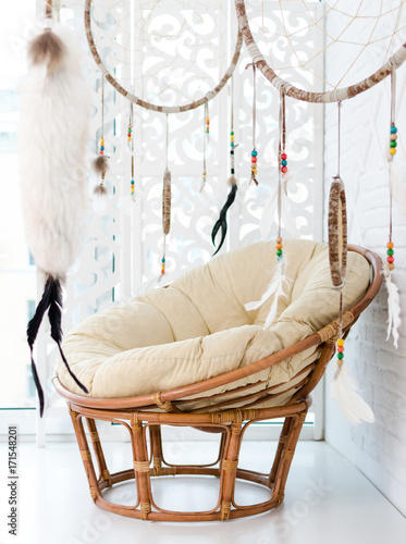 Rattan chair and dream catcher.