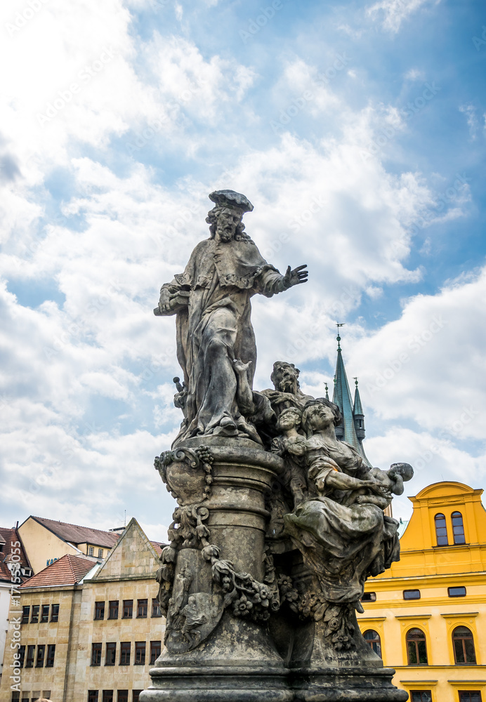 Picturesque old statue on the Charles Bridge in Prague Picturesque old statue on the Charles Bridge in Prague