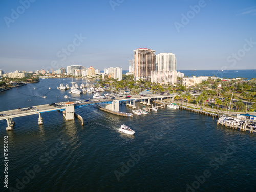 Boat passing drawbridge in Fort Lauderdale, Florida. Aerial view.