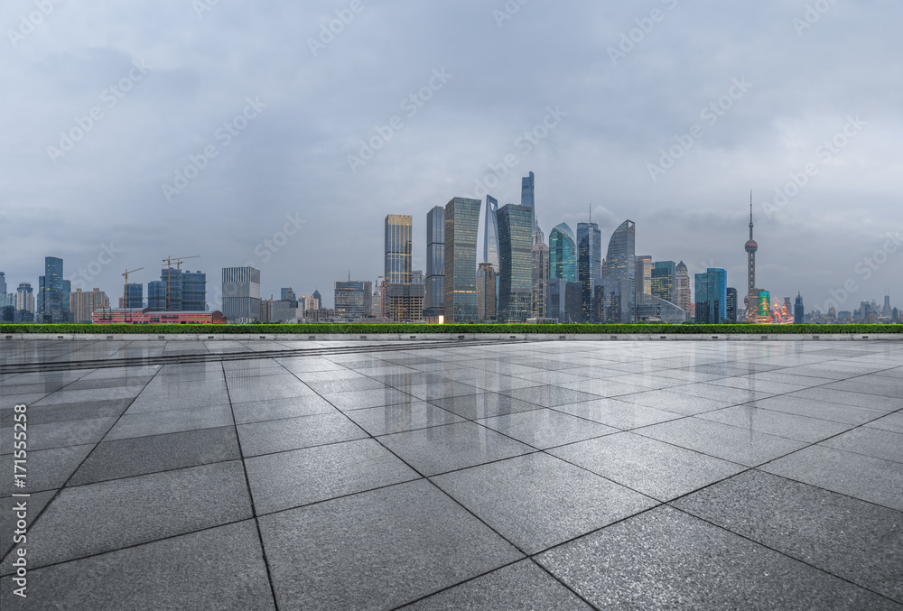 cityscape and skyline of shanghai from empty brick floor. cityscape and skyline of shanghai from empty brick floor.