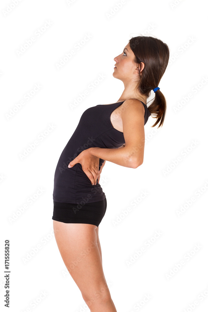 Foto de Mujer estiramiento la cintura y la espalda sobre un fondo blanco  aislado. Vista de frente y de cerca. Concepto: Gimnasia do Stock