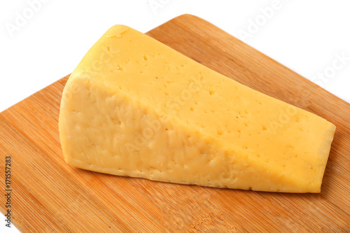 a piece of cheese on a white background