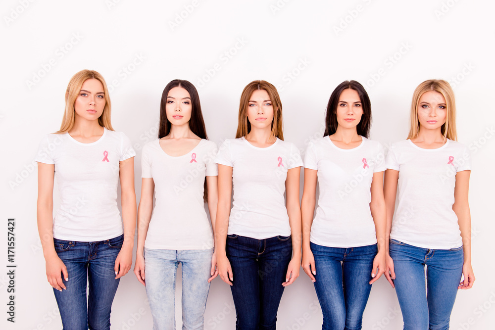 Women unity, connection, oneness, help, support, resisting breast cancer. We are family, friends, sisters. Five strong minded ladies, with pink ribbon symbols on their breasts, serious and strong Women unity, connection, oneness, help, support, resisting breast cancer. We are family, friends, sisters. Five strong minded ladies, with pink ribbon symbols on their breasts, serious and strong