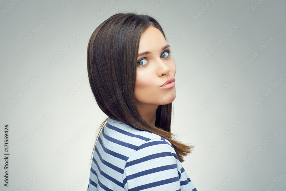 Funny portrait of girl showing duck lips. Funny portrait of girl showing duck lips.